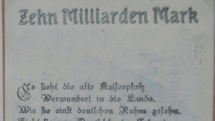 Spruch auf dem Zehn-Milliarden-Mark Schein: "Es sieht die Kaiserpfalz verwundert in die Lande. Wie sie einst deutschen Ruhm gesehen, sieht sie nun Deutschlands Schande."