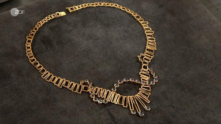 Neben der emotionalen Geschichte &uuml;berzeugte auch das Collier selbst. Wie Expertin Wendela Horz erkl&auml;rte, handelte es sich um ein handgearbeitetes St&uuml;ck aus 750er Gelbgold. Gefertigt wurde es von der renommierten Goldschmiedin K&auml;the Ruckenbrod, die bereits 1929 ein eigenes Atelier in Heidelberg-Ziegelhausen er&ouml;ffnet hatte.