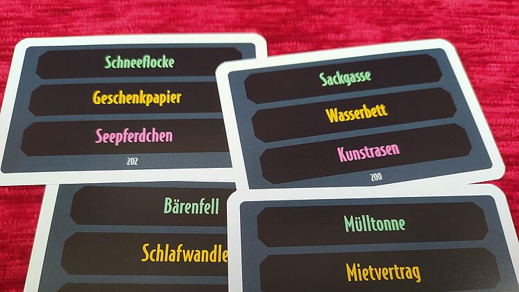 Spiele-Test Less is More: Rezension des kreativen Party-Wortspiels