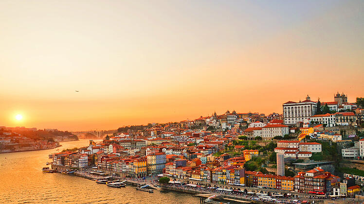 Sunset over the Porto city center and the Douro river, Portugal.