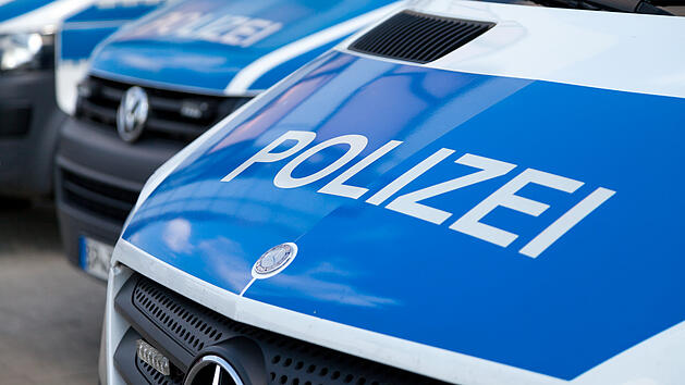 german police cars stands on airport
