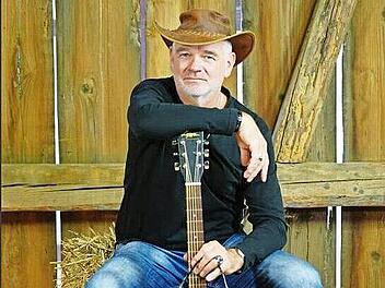Eric Damster spielt Countrymusik.