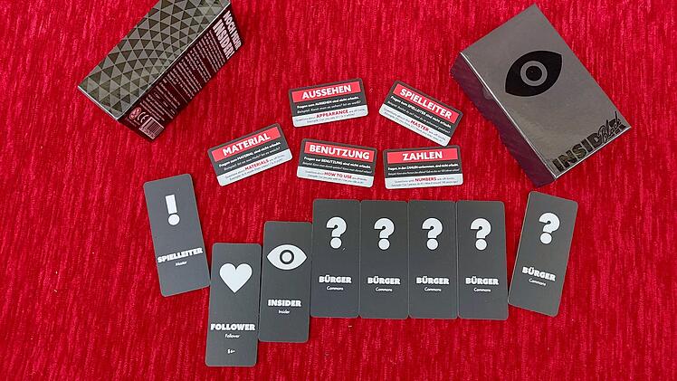 Spiele-Test "Insider Black": Originelle Party-Wortfindespiel von Oink Games