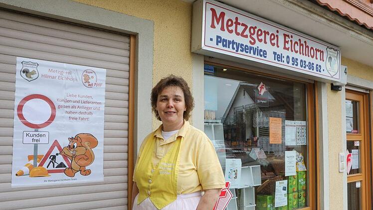 Geschäftsleute klären ihre Kunden auf.Foto: Barbara Herbst