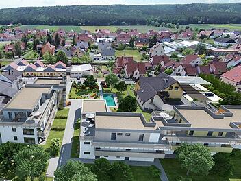 Die Fotomontages zeigt, wie Pettstadt mit Begegnungsstätte aussehen würde.  Fotomontage: Tschopoff | Grafik & Layout