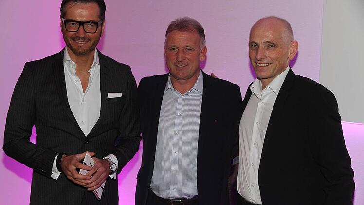 Georg Groscurth (Fürstlich Castell'sche Bank) und Wolfgang Heyder freuten sich über den Besuch von Andreas Brehme (Mitte).