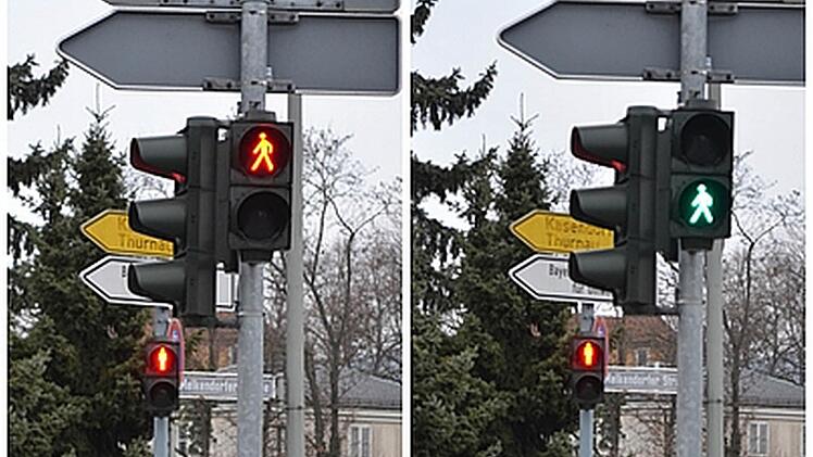 Ein rotes Ampelmännchen, das geht statt steht, verwirrt die Fußgänger.  Foto: privat