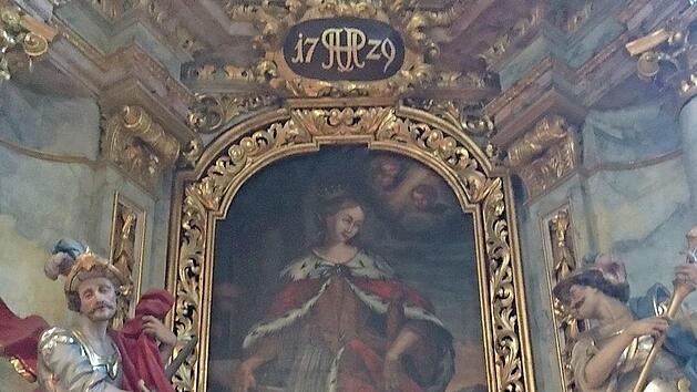 Der rechte Altar in der Barockkirche St. Johannes der T&auml;ufer in Schirnaidel zeigt die hl. Katherina flankiert vom hl. Martin und hl. Georg.  Foto: Eduard N&ouml;th