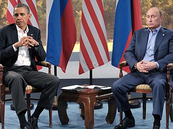 Haben sich im Moment nicht viel zu sagen - US-Präsident Barack Obama (links) und Russlands starker Mann Wladimir Putin. Foto: dpa/Archiv