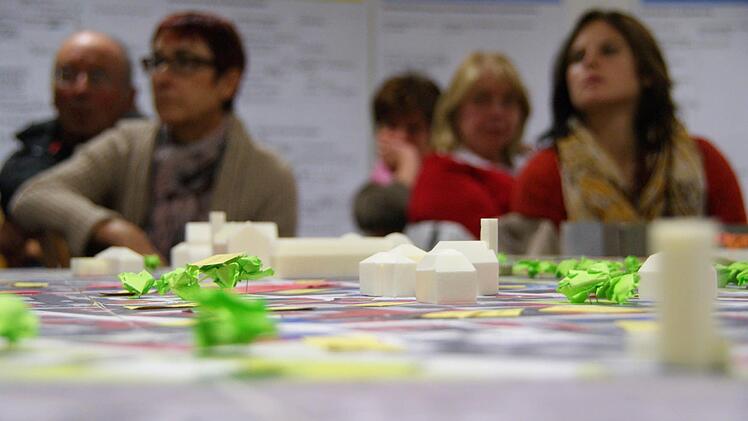 Auf einem Plan der Innenstadt sind die markantesten Gebäude im Modell dargestellt. Foto: Arkadius Guzy