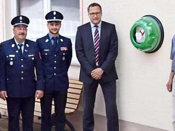 Vorsitzender Christian Martin, KBM und 2. Kommandant Manfred Friedrich, 1. Kommandant Peter Friedrich, Geschäftsstellenleiter Sparkasse Bamberg Christian Böhm und Kirchenpfleger Georg Dennert  Foto: See