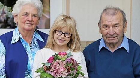 Hedwig und Alfons Maier mit Urenkelin Lisa Foto: Franz Galster